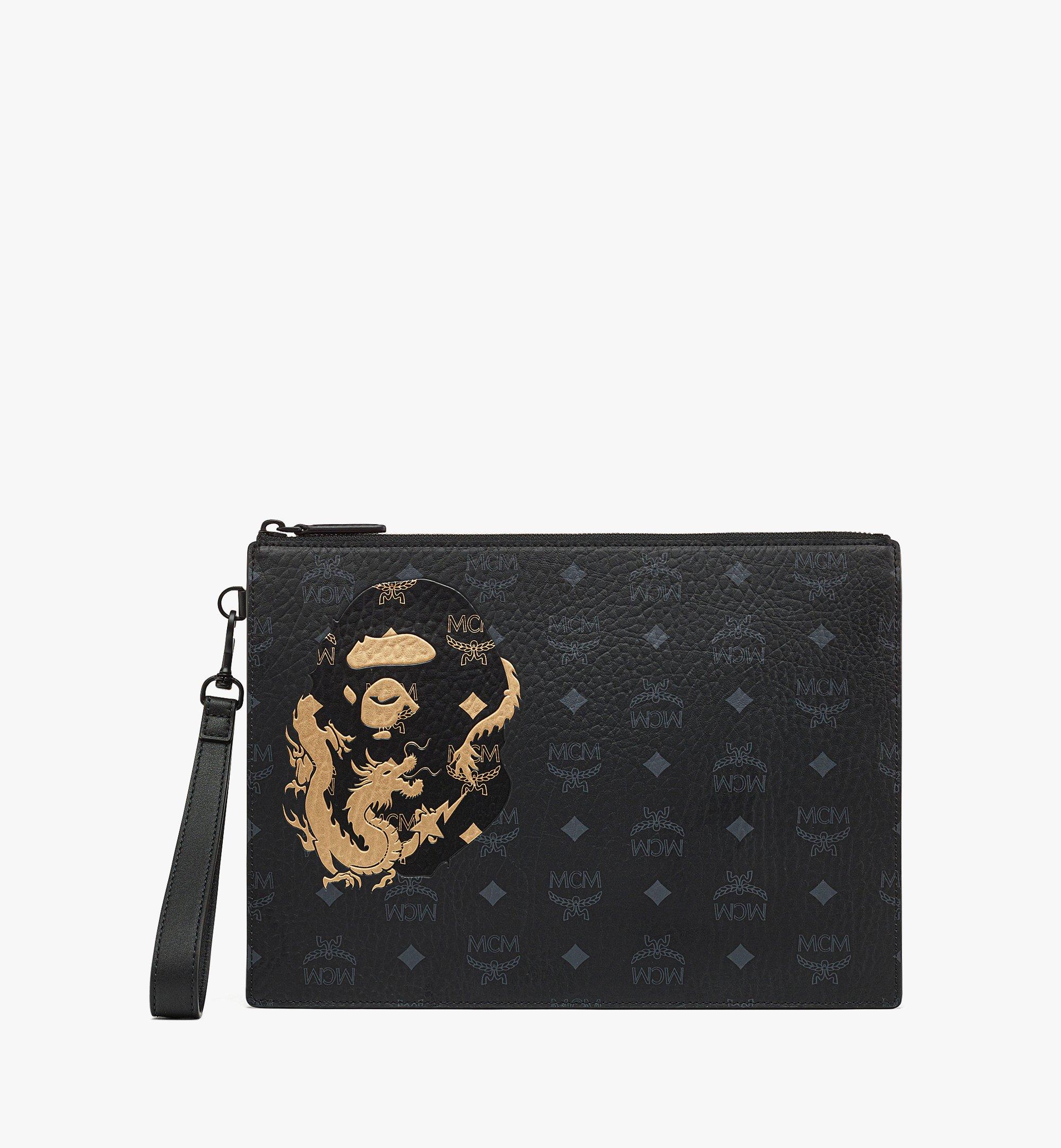 Black and outlet gold mcm bag